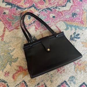 Vintage black leather coach bra lay tote. Gold hardware, rare EUC